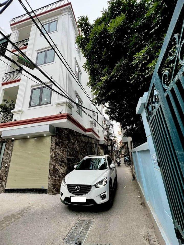 Nhà đẹp Mặt Đường Di Trạch 33M 5 Tầng, kinh doanh, ô tô đỗ cửa, tiện ích giá 5.2 tỷ