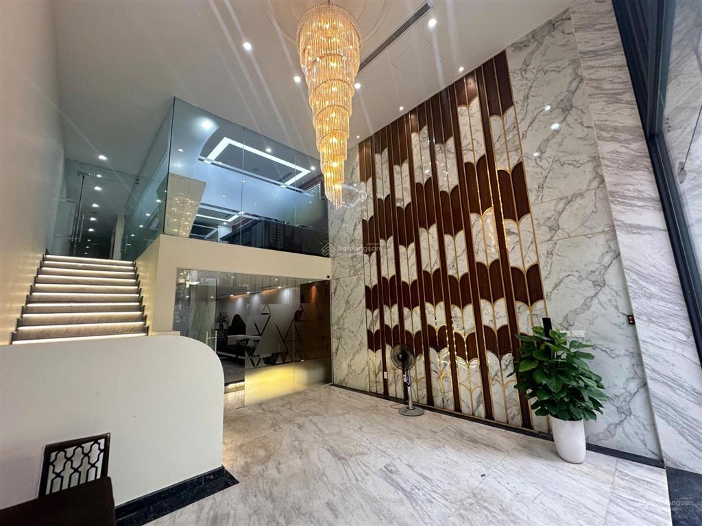 Bán tòa văn phòng phố thái hà, dt 130m2, 8 tầng, mặt tiền 6m ngõ thông ô tô tránh, 30m ra mặt phố