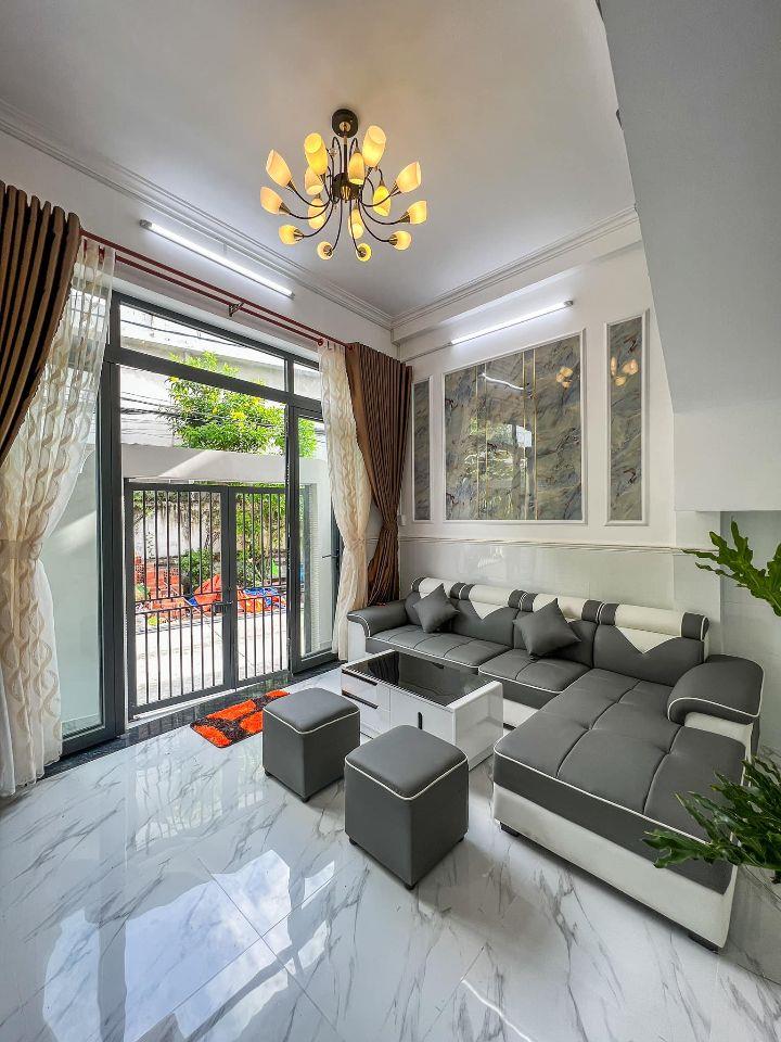 NHÀ TRỆT 2 LẦU GÓC MẶT TIỀN HẺM 50 QUANG TRUNG - GẦN CHỢ TÂN AN