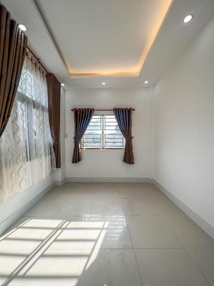 NHÀ TRỆT 2 LẦU GÓC MẶT TIỀN HẺM 50 QUANG TRUNG - GẦN CHỢ TÂN AN