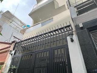 Nhà mới 4 tầng sát đường đường Trần Hưng Đạo P1Q5