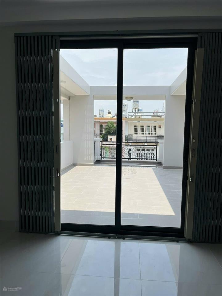 Nhà mới 95% đường 23 kdc bình phú 4,5x20m, 4 lầu