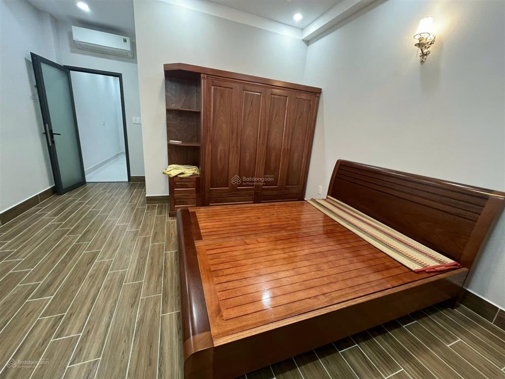 Nhà mới 95% đường 23 kdc bình phú 4,5x20m, 4 lầu