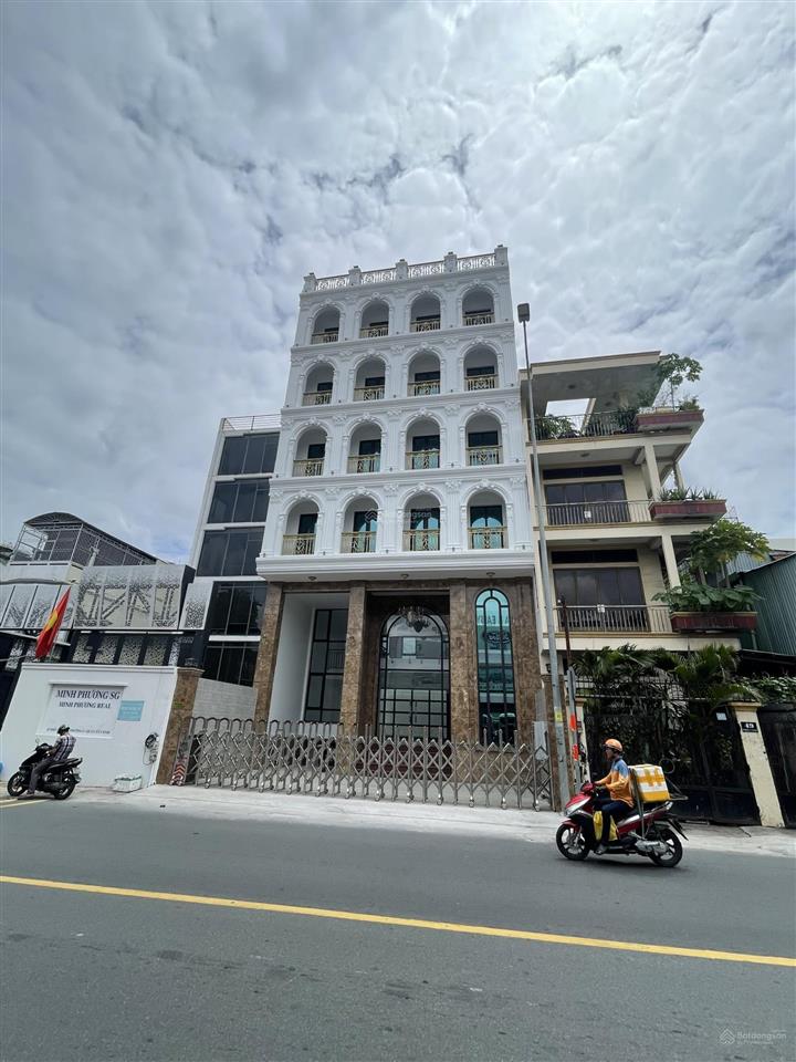 Bán nhà mt phổ quang, p. 9, q. pn  10x18m. cn 175m2  hầm, 4 lầu  hđt 165tr/th  57 tỷ