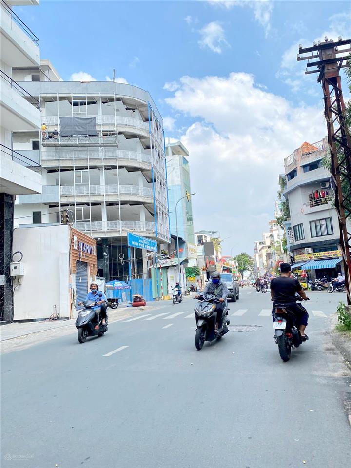 Mt điện biên phủ p.15 q.bình thạnh  11x27m. cn 297m2. hầm, 4 tầng, st  hđt 260tr/th  76 tỷ