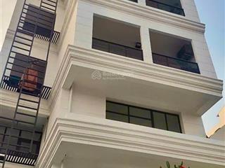 Bán tòa nhà căn hộ dịch vụ mặt tiền ngay cầu lò gốm