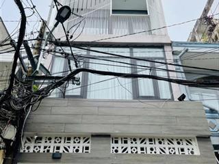 Căn nhà 4 tầng xe hơi đậu tận cửa cách 10m ra mặt tiền đường lớn  0906 389 ***