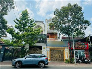 Nhà mặt tiền đường nguyễn văn trỗi  gần vòng xoay hiệp thành  1 trệt 2 lầu , 1 hầm xe hơi