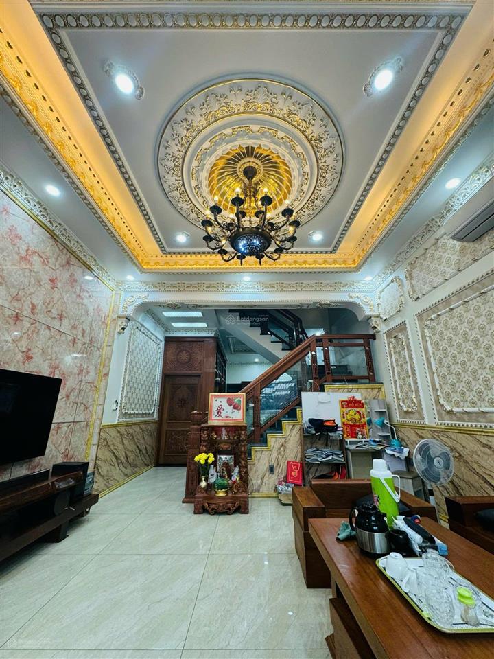 Nhà mặt tiền đường nguyễn văn trỗi  gần vòng xoay hiệp thành  1 trệt 2 lầu , 1 hầm xe hơi