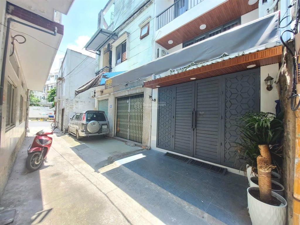 Chính chủ. nhà 1 trệt 3 lầu sân thượng. cách 10m ra mặt tiền pvt. p10. đối diện cityland. dt 4x12m