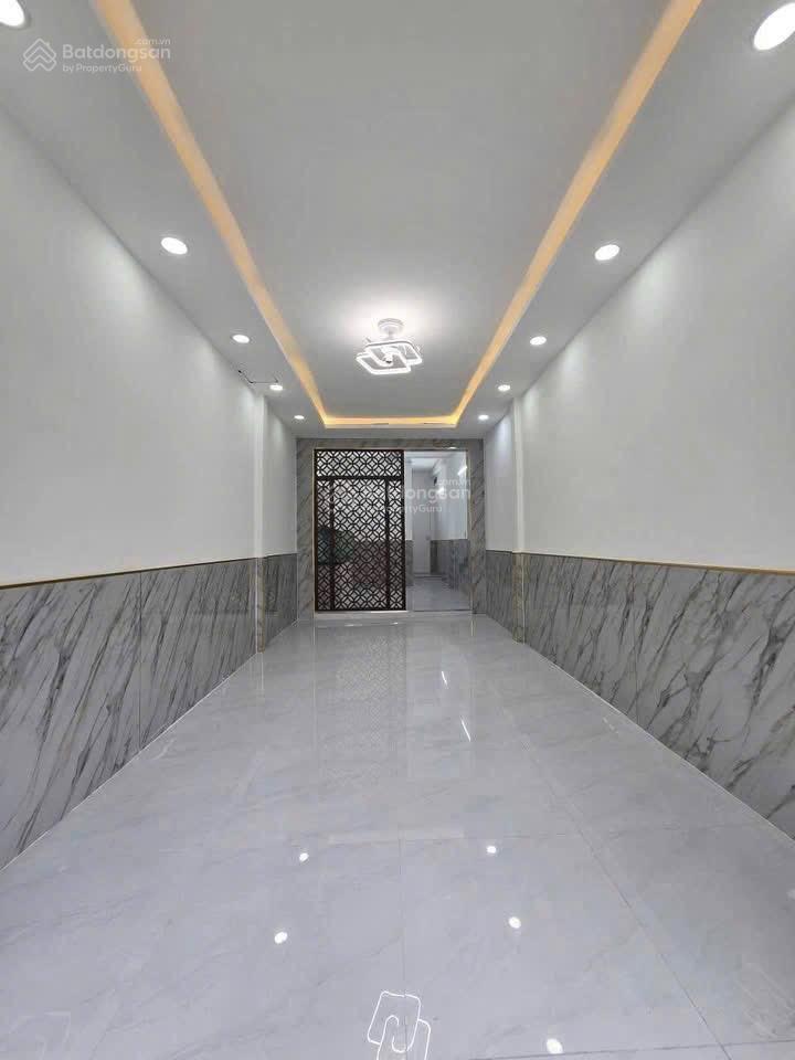 Nhà bán 4 tầng 3,5 x 153 pn,3 wc btct mặt tiền kinh doanh tạ quang bửu p2q8 cũ sổ hồng h công