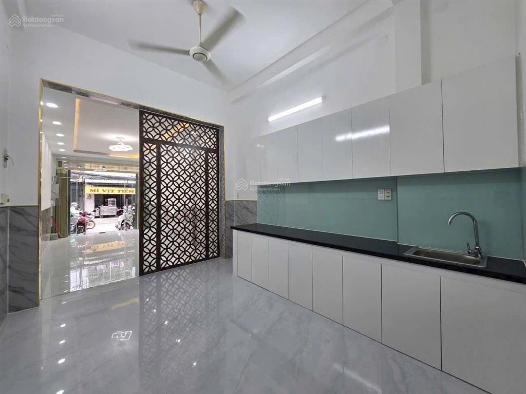 Nhà bán 4 tầng 3,5 x 153 pn,3 wc btct mặt tiền kinh doanh tạ quang bửu p2q8 cũ sổ hồng h công