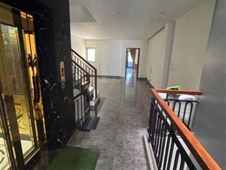 Bán toà nhà 6,5 tầng đường nguyễn hữu thọ có thang máy