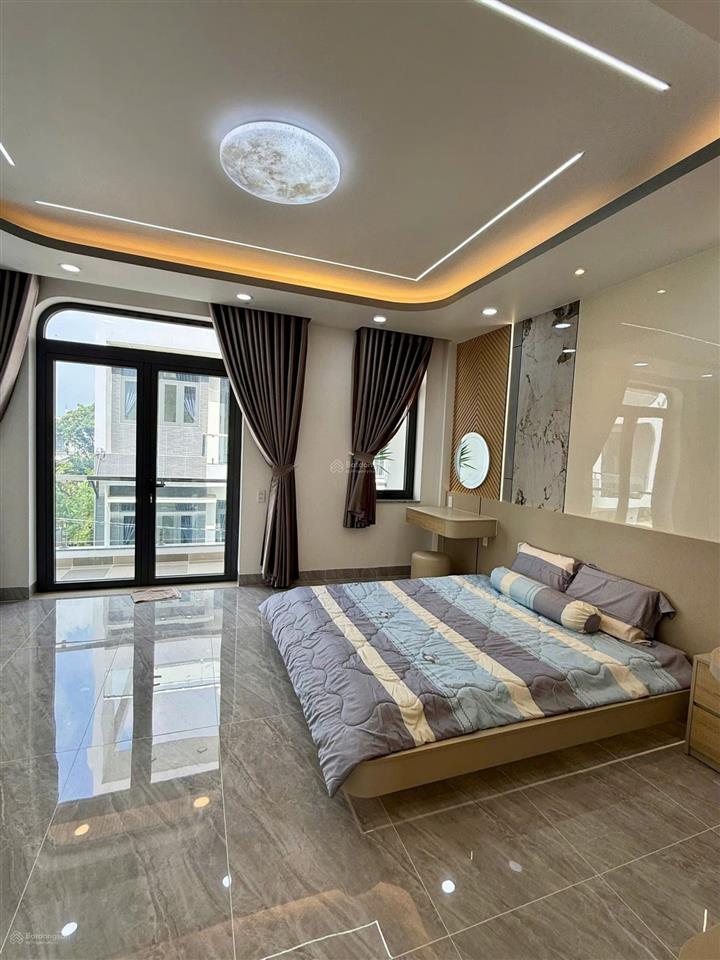 Siêu phẩm nhà mới tuyệt đẹp gần chợ đầu mối hóc môn , thiết kế hiện đại trệt  lửng  2 lầu  st