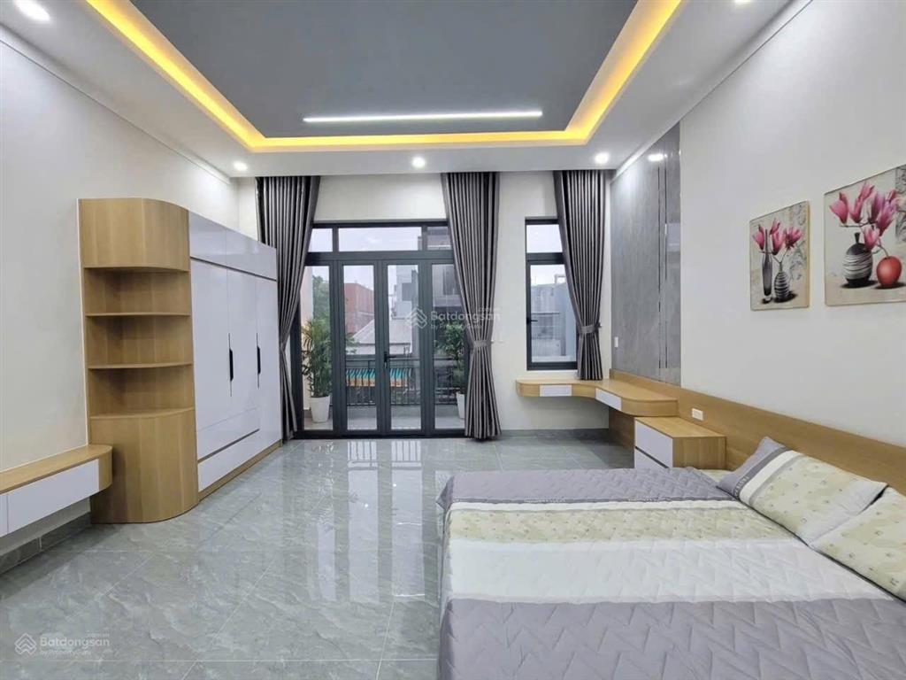 Bán nhà mới full nội thất đường thông có gara ôtô chỉ mang quần áo vào ở