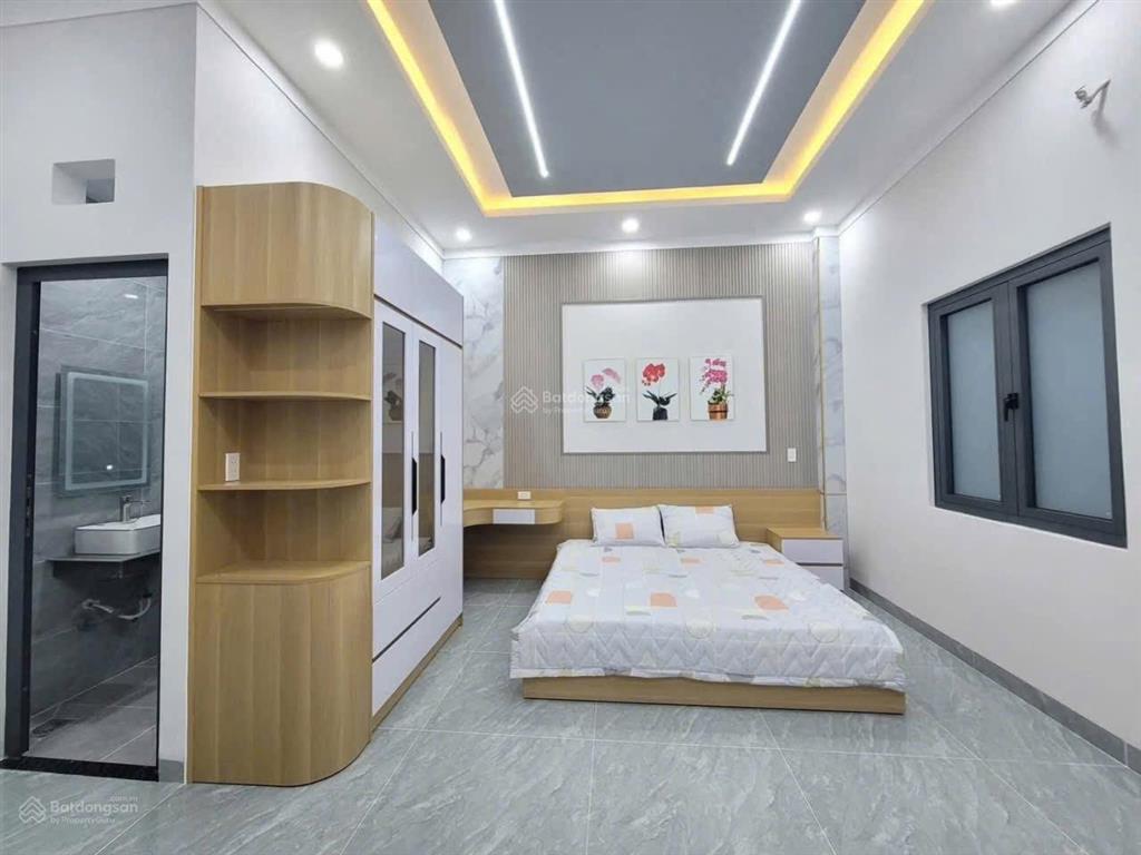Bán nhà mới full nội thất đường thông có gara ôtô chỉ mang quần áo vào ở