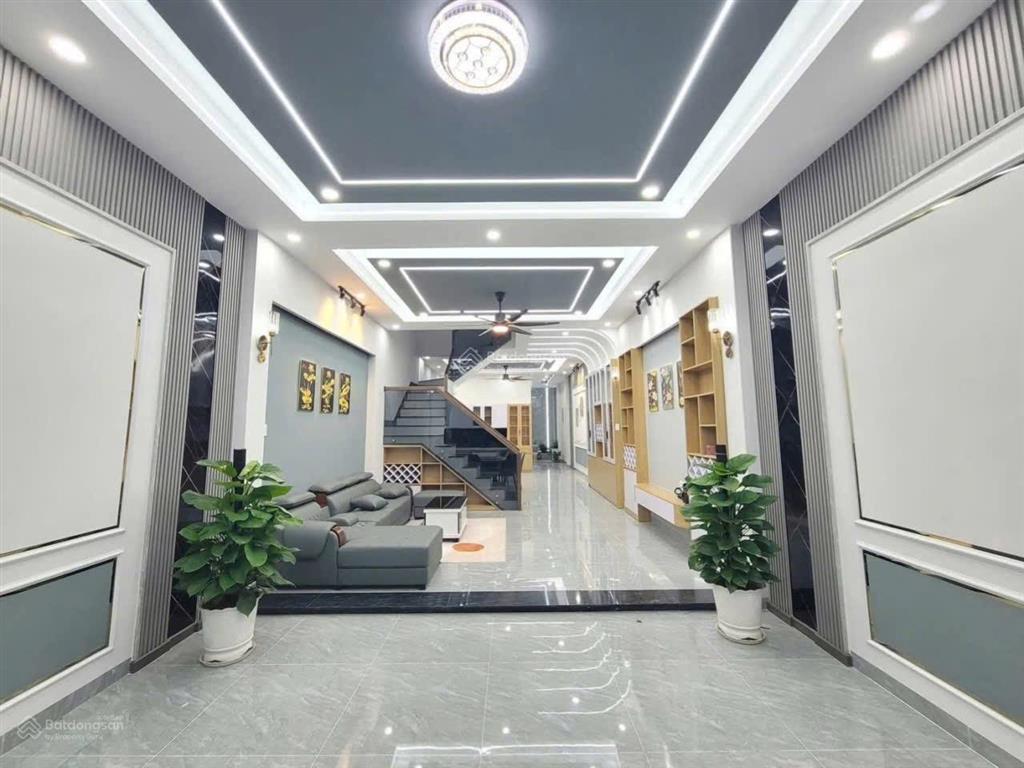 Bán nhà mới full nội thất đường thông có gara ôtô chỉ mang quần áo vào ở