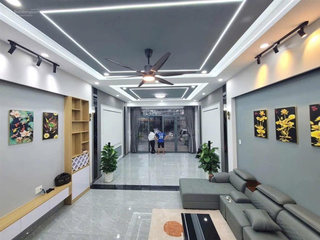 Bán nhà mới full nội thất đường thông có gara ôtô chỉ mang quần áo vào ở