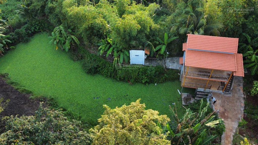 Cần bán lô đất, có nhà vườn 6500m2 tc 300m2. góc 2 mặt tiền đường nhựa