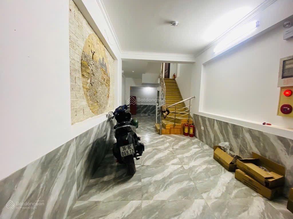 Siêu phẩm đầu tư 1  0  2 quận đống đa, 8,96 tỷ sổ đỏ 57m2x7tầng, 14 phòng cho thuê.  0977 467 ***