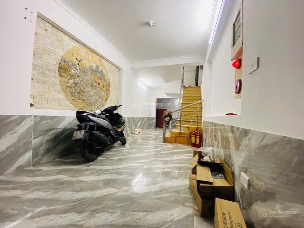 Siêu phẩm đầu tư 1  0  2 quận đống đa, 8,96 tỷ sổ đỏ 57m2x7tầng, 14 phòng cho thuê.  0977 467 ***