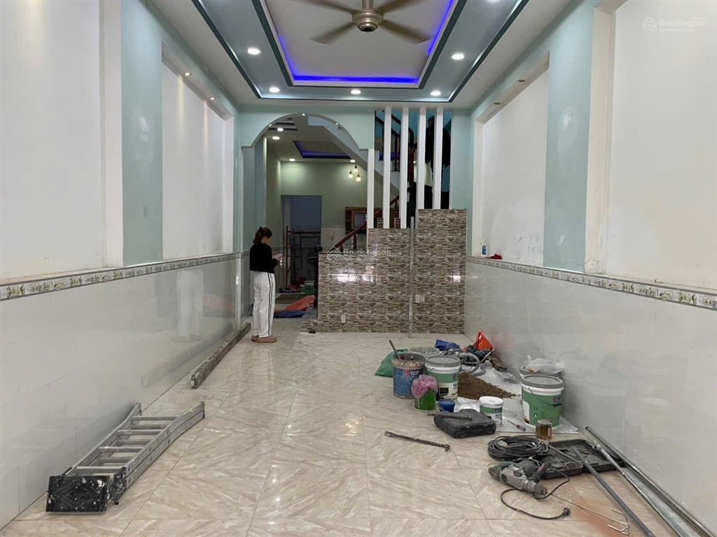 Bán nhà đường nhựa 8 m sân xe hơi trệt lầu gần trường học và chợ phường tân đông hiệp , dĩ an