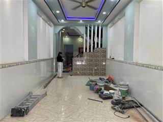 Bán nhà đường nhựa 8 m sân xe hơi trệt lầu gần trường học và chợ phường tân đông hiệp , dĩ an