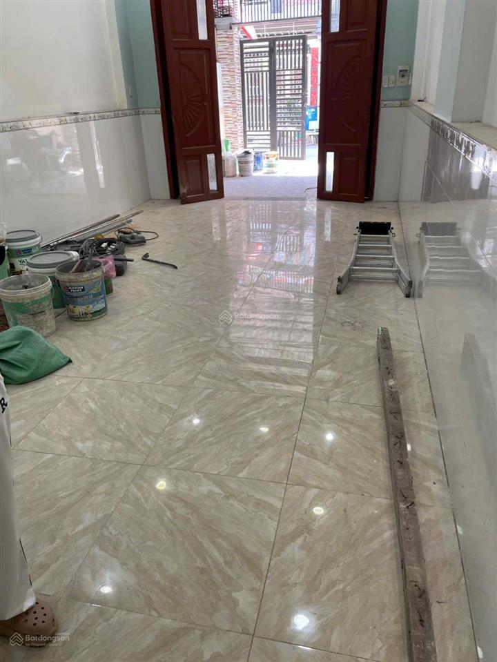 Bán nhà đường nhựa 8 m sân xe hơi trệt lầu gần trường học và chợ phường tân đông hiệp , dĩ an