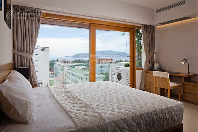 Bán ks 13 tầng đường trần quang khải, lộc thọ, nha trang. dt 203m2 (ngang 9m) có 50p kd  giá 95 tỷ