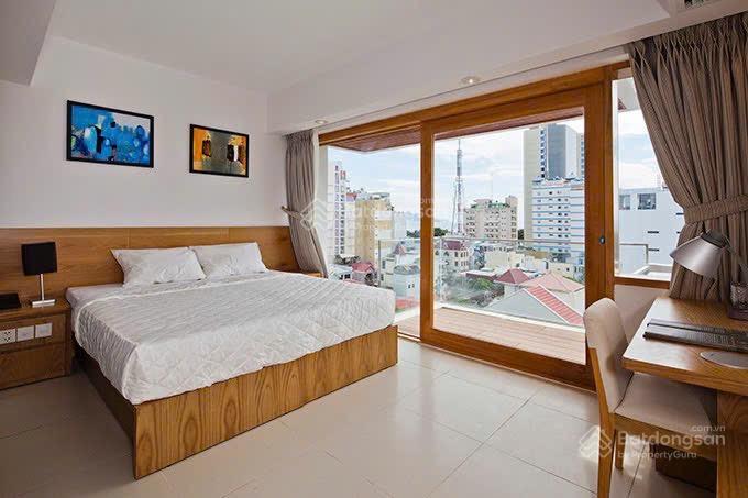 Bán ks 13 tầng đường trần quang khải, lộc thọ, nha trang. dt 203m2 (ngang 9m) có 50p kd  giá 95 tỷ