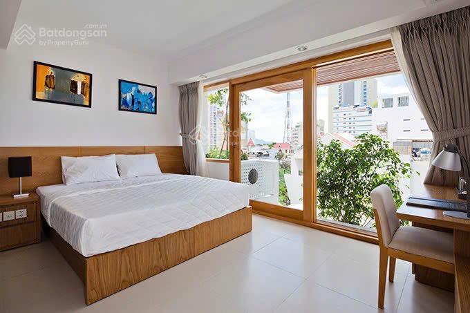 Bán ks 13 tầng đường trần quang khải, lộc thọ, nha trang. dt 203m2 (ngang 9m) có 50p kd  giá 95 tỷ