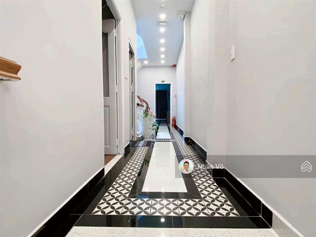 14.5 tỷ tl  mt âu cơ kế nguyễn hồng đào. dt 3.7mx28m. vị trí đẹp