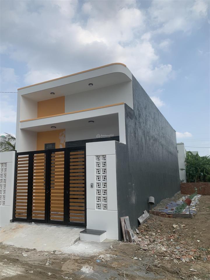 Bán nhà đức hòa xã mỹ hạnh nam. dt 5x24m sổ hồng riêng đường trước nhà xe hơi,  0918 551 ***
