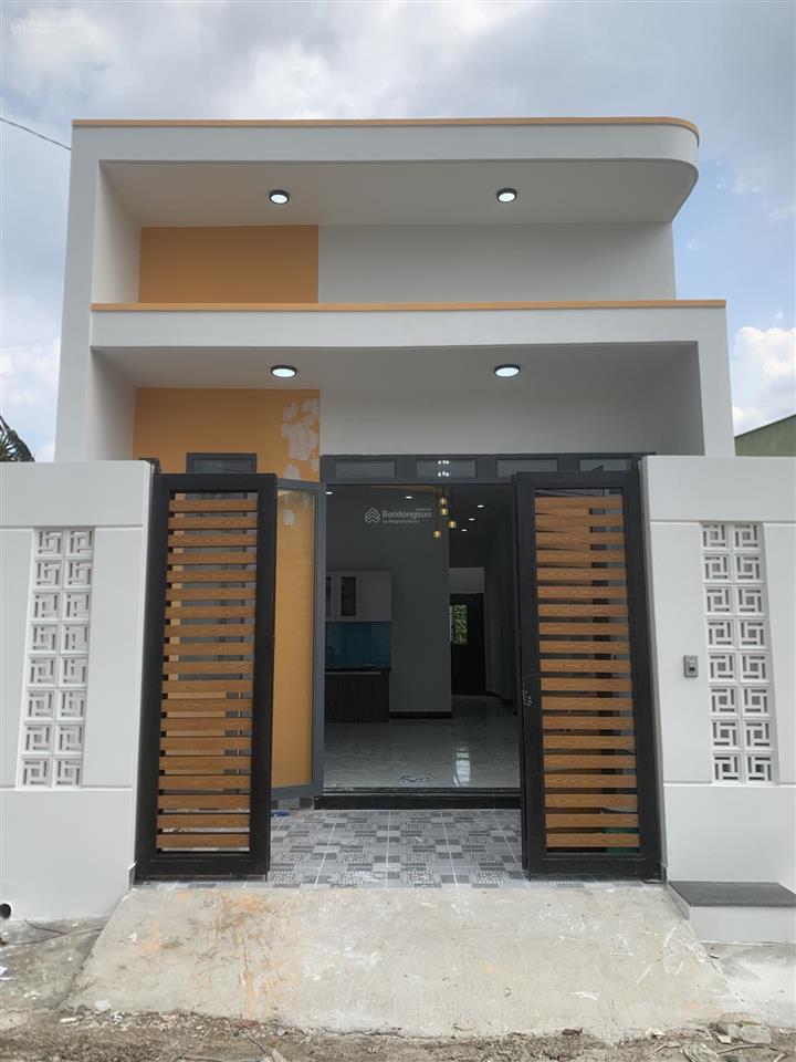 Bán nhà đức hòa xã mỹ hạnh nam. dt 5x24m sổ hồng riêng đường trước nhà xe hơi,  0918 551 ***