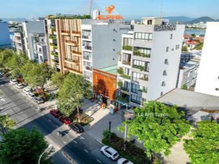 Bán tòa building 7 tầng mặt tiền đường 15m trần hưng đạo đối diện tòa căn hộ monarchy. gần cầu rồng