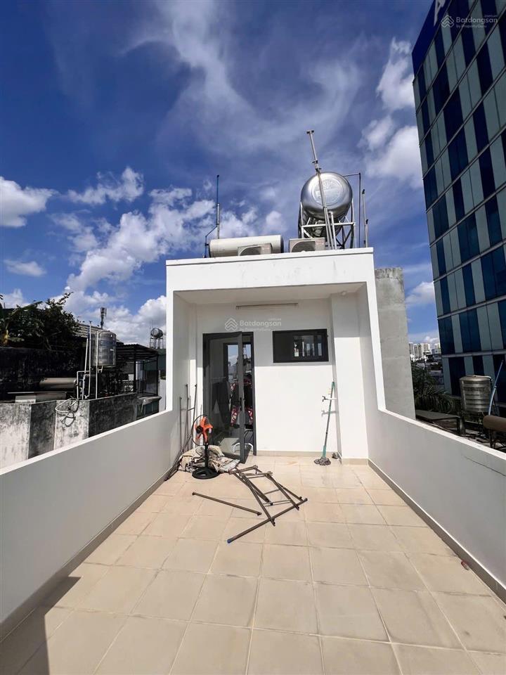 Bán nhà cmt8 q3 50m2 nhà góc 5 tầng dòng tiền 25tr 7,7 tỷ tl