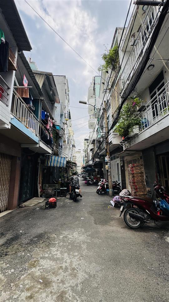 Bán nhà quận 4 mặt tiền đường số, 2 lầu giá tốt