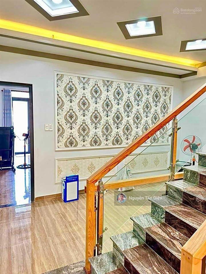 Nhà 1 trệt 2 lầu 1 lửng mặt tiền lê thị trung an phú tp thuận an bình dương