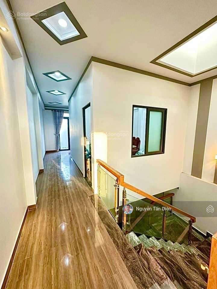 Nhà 1 trệt 2 lầu 1 lửng mặt tiền lê thị trung an phú tp thuận an bình dương
