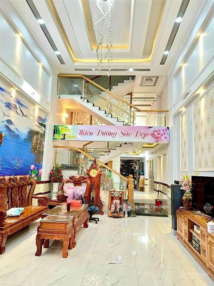 Nhà 1 trệt 2 lầu 1 lửng mặt tiền lê thị trung an phú tp thuận an bình dương