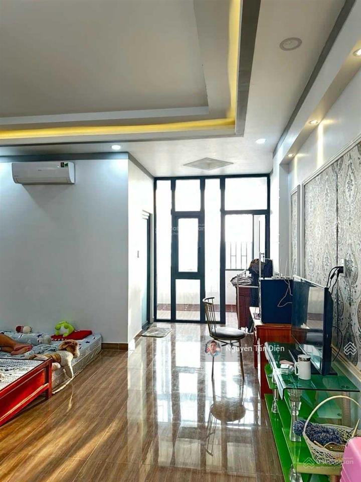 Nhà 1 trệt 2 lầu 1 lửng mặt tiền lê thị trung an phú tp thuận an bình dương