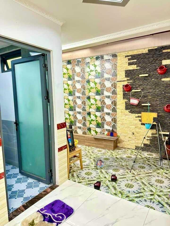 Nhà 1 trệt 2 lầu 1 lửng mặt tiền lê thị trung an phú tp thuận an bình dương