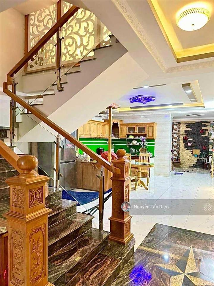 Nhà 1 trệt 2 lầu 1 lửng mặt tiền lê thị trung an phú tp thuận an bình dương
