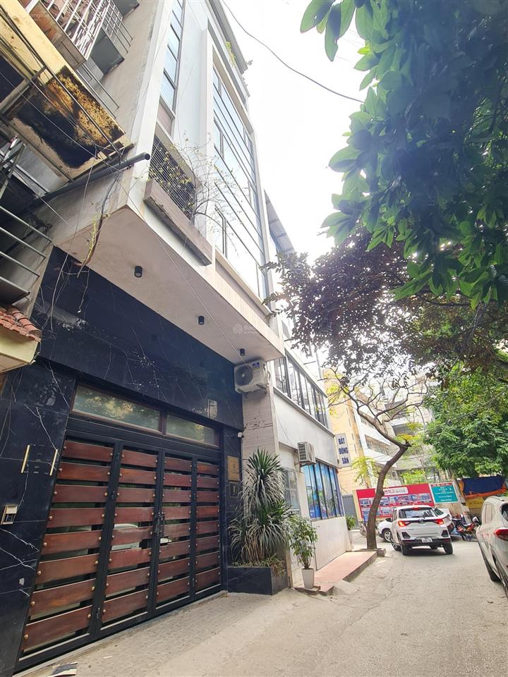 Bán tòa nhà văn phòng vừa ở vừa kinh doanh đường phạm hùng sát kđt mễ trì 7 tầng t.máy, ô tô tránh