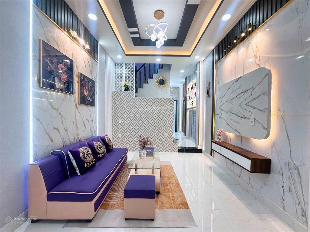 Bán nhà sổ hồng riêng 1 trệt 2 lầu 4 pn ,3 tollet hẻm thánh thất tân kim long an