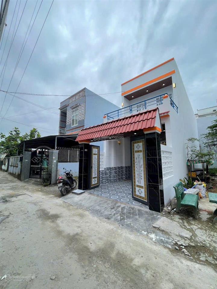 Bán nhà mới hoàng thiện sổ hồng riêng 1 trệt 1 lầu 3pn ,2toliet cách ngã ba tân kim 400 m