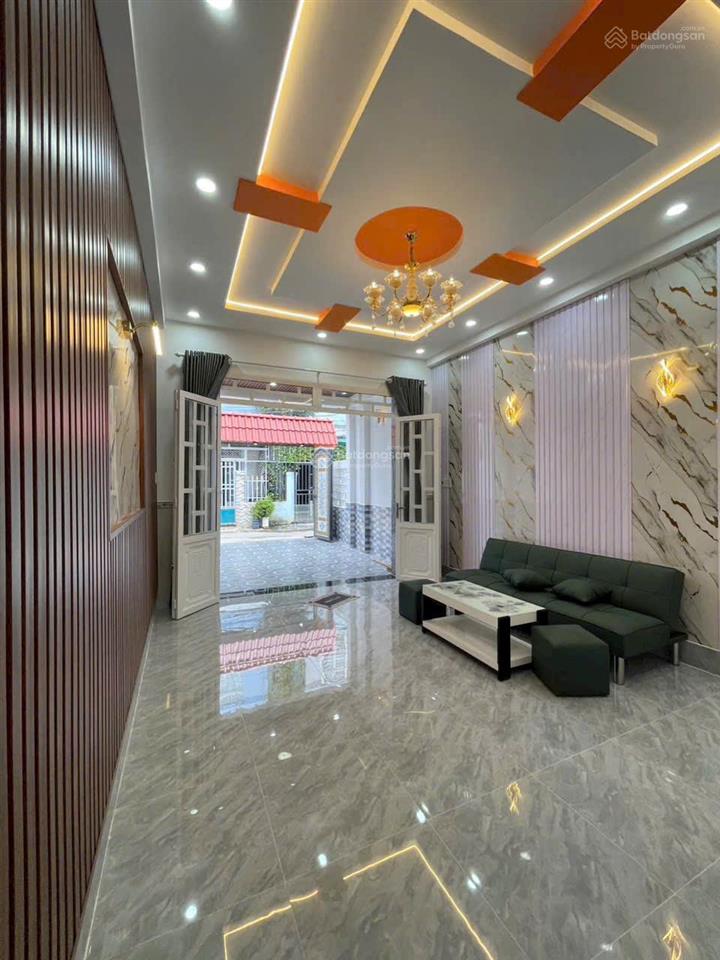 Bán nhà mới hoàng thiện sổ hồng riêng 1 trệt 1 lầu 3pn ,2toliet cách ngã ba tân kim 400 m