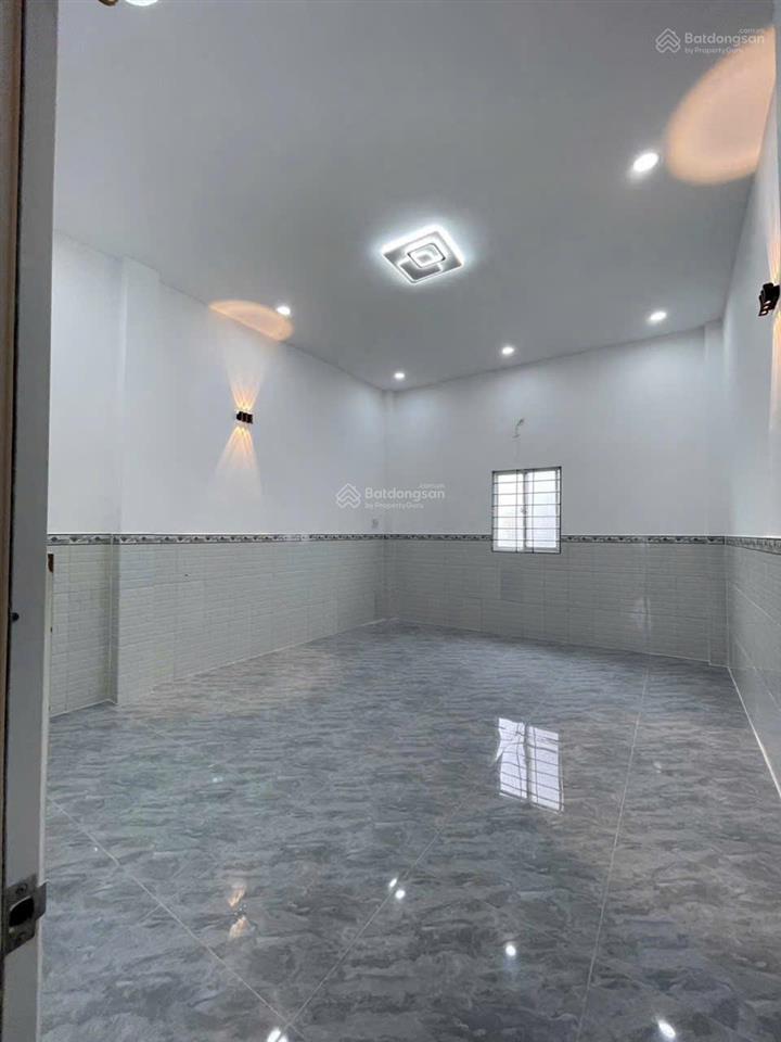 Bán nhà mới hoàng thiện sổ hồng riêng 1 trệt 1 lầu 3pn ,2toliet cách ngã ba tân kim 400 m