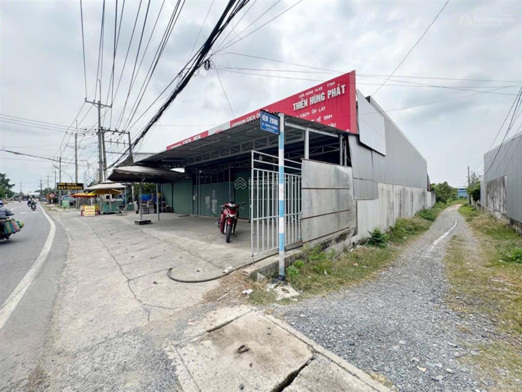 Nhà xưởng mặt tiền hùng vương xã phú đông (27x50m) giảm giá sâu còn 14tr/m2 dt 1338m2 có 300m2 thổ