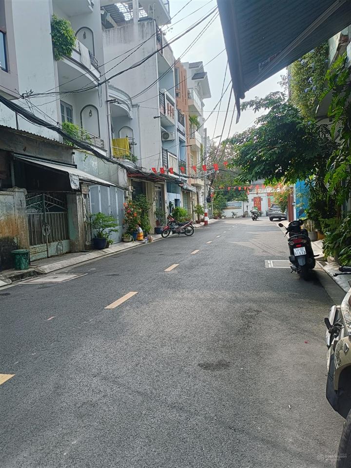 9,5 tỷ ! góc 2 mặt tiền hẻm 7m đường lũy bán bích.q tân phú. 4x15m. 4 tầng. hẻm thông